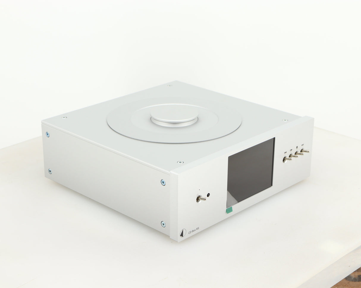 Front left corner of a used Pro-Ject CD Box RS CD Transport in a silver finish