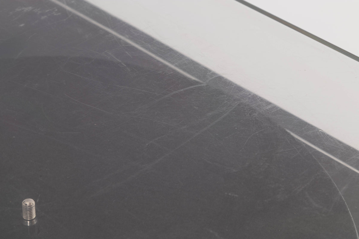 Close up of a used Pro-ject P2 Turntable / Goldring 2 Cartridge in a Black finish showing scratching on top of lid