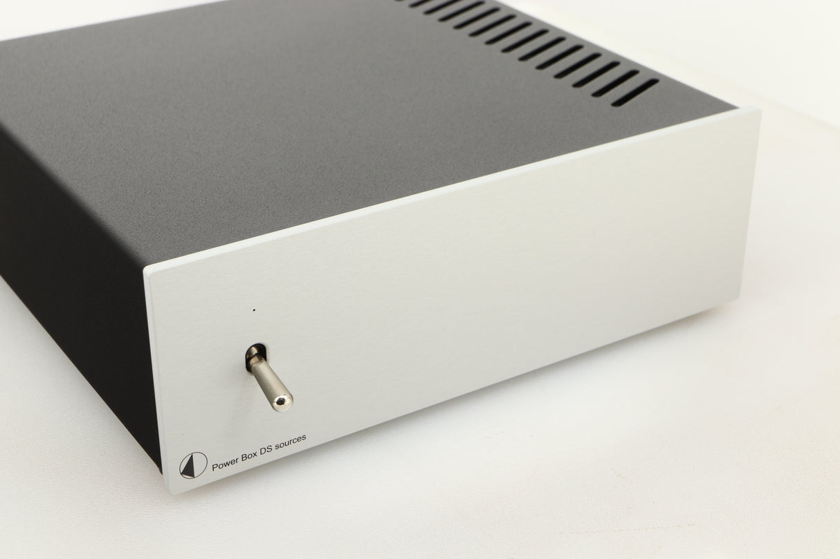 Close up view of a used Pro-Ject Power Box DS Sources Power Supply in Silver finish