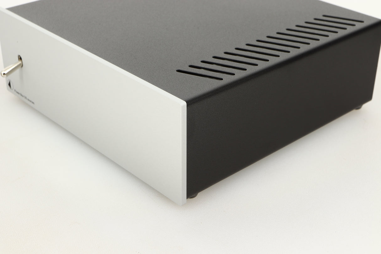 Front right corner view of a used Pro-Ject Power Box DS Sources Power Supply in Silver finish