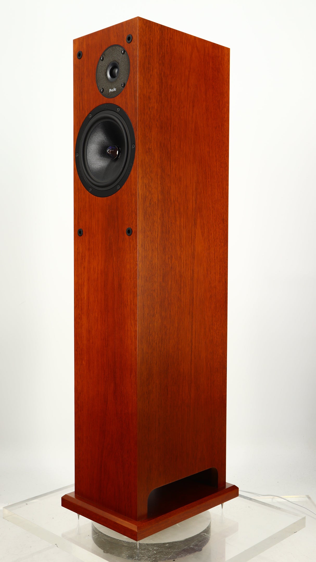 Front right corner of a used Proac Response D18 Floorstanding Speaker in a mahogany finish