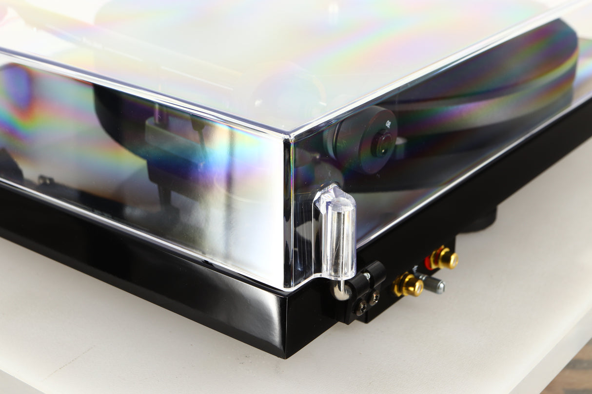 Rear right corner of a used Project Debut Carbon Evo DC Turntable in a black finish