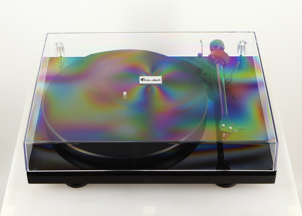 Front view of a used Project Debut Carbon Evo DC Turntable in a black finish showing lid