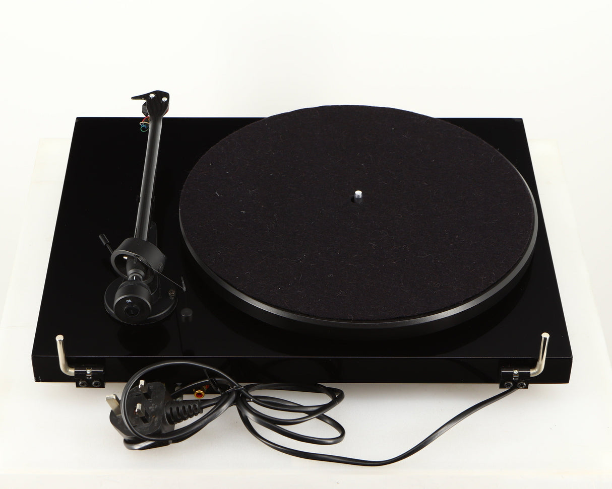 Rear view of a used Project Debut Carbon Turntable in a piano black finish