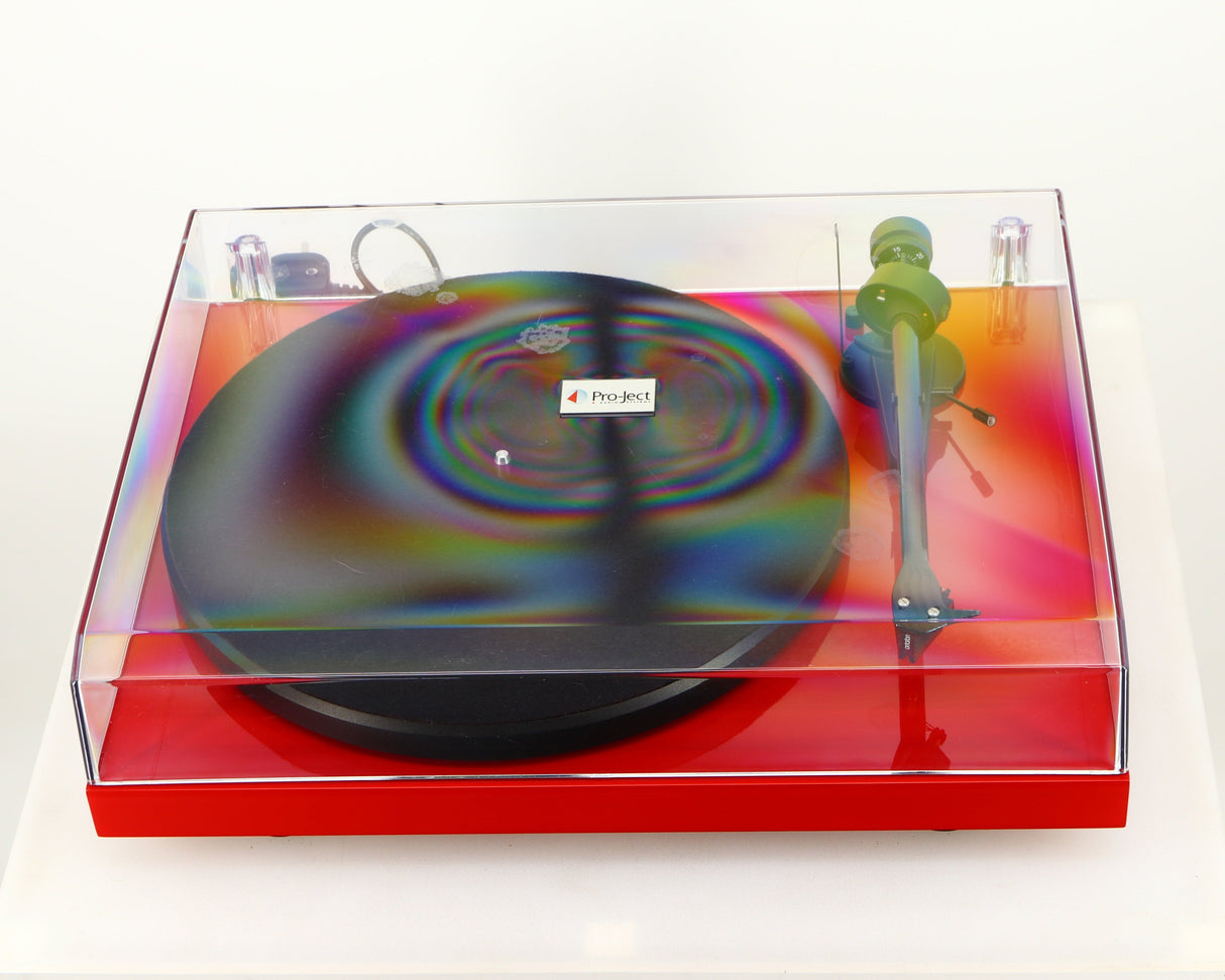 Front view of a used Project Debut Carbon Turntable in a red finish showing Lid