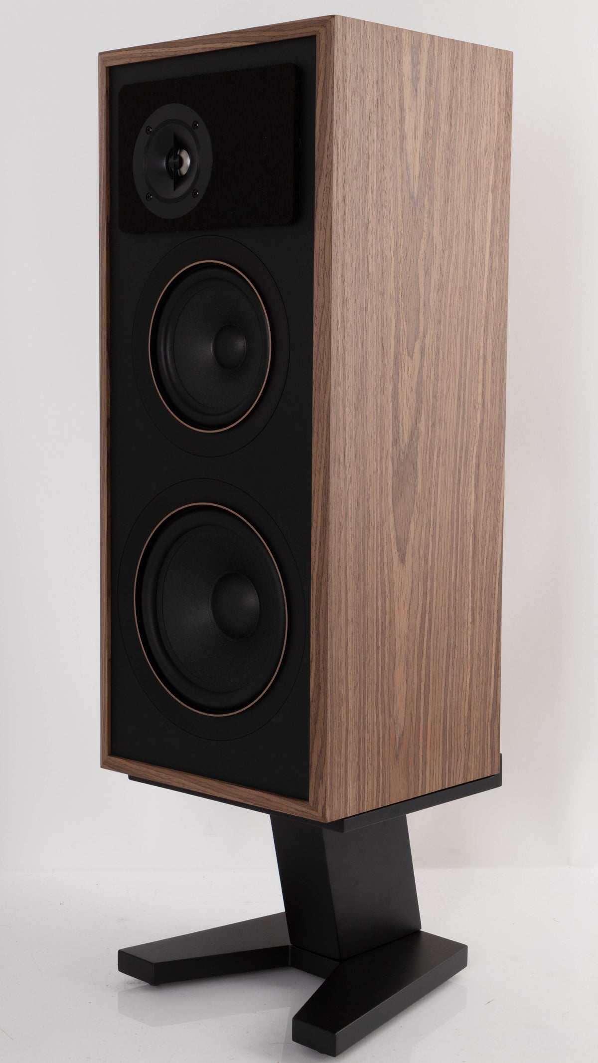 Front right corner of a used PSB Passif-50 Anniversary Edition Standmount Speaker in a Walnut finish