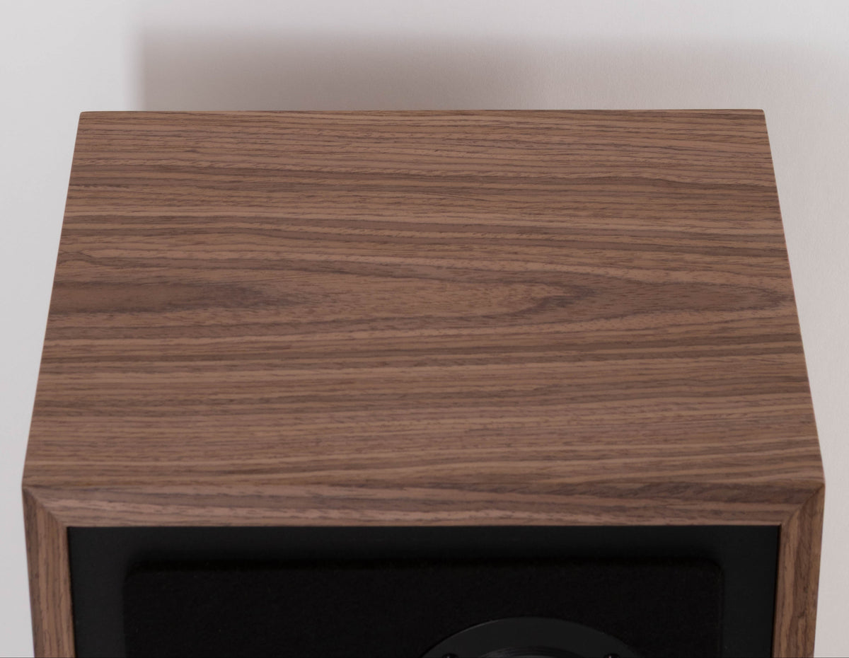 Top of a used PSB Passif-50 Anniversary Edition Standmount Speaker in a Walnut finish