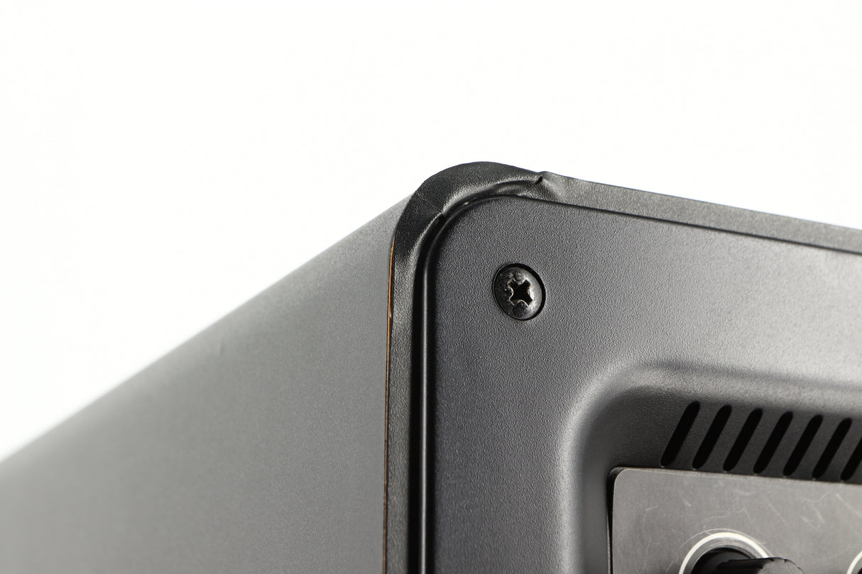 Close up of a used Q Acoustics 2070si Subwoofer in a black finish showing blemish on rear right corner