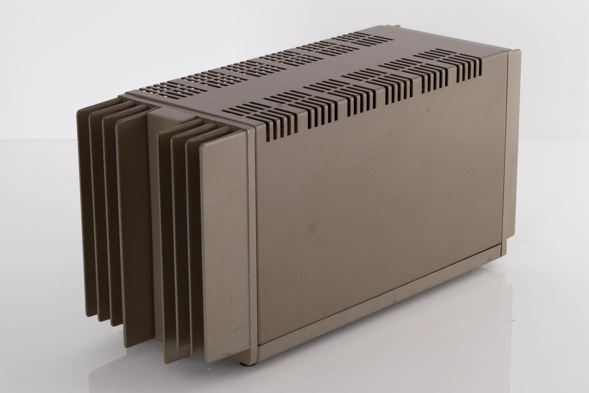 Front right corner of a used Quad 303 Power Amplifier
