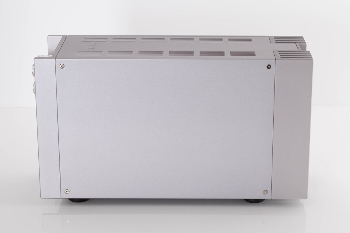 Left side view of a used Quad 303 Power Amplifier in a Silver finish