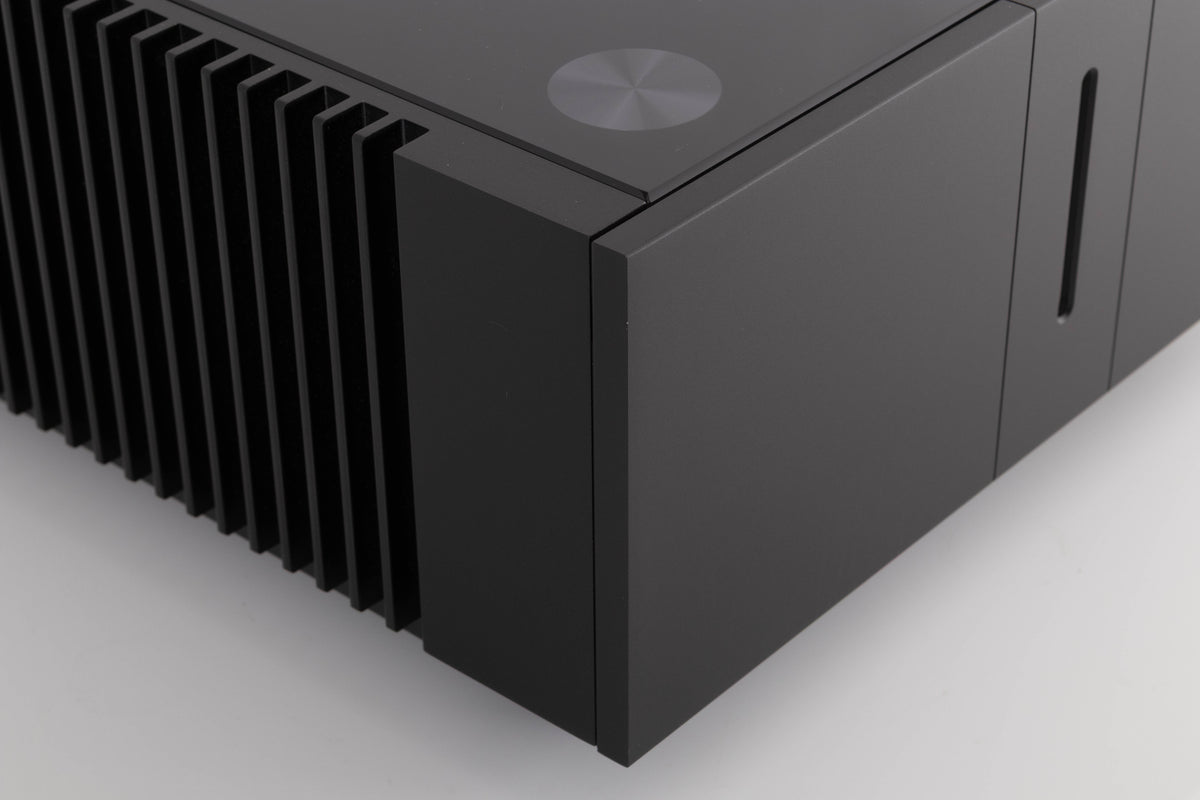 Front left corner of a used Quad Artera Stereo Power Amplifier in a Black finish