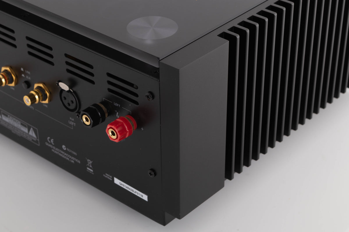 Rear left corner of a used Quad Artera Stereo Power Amplifier in a Black finish