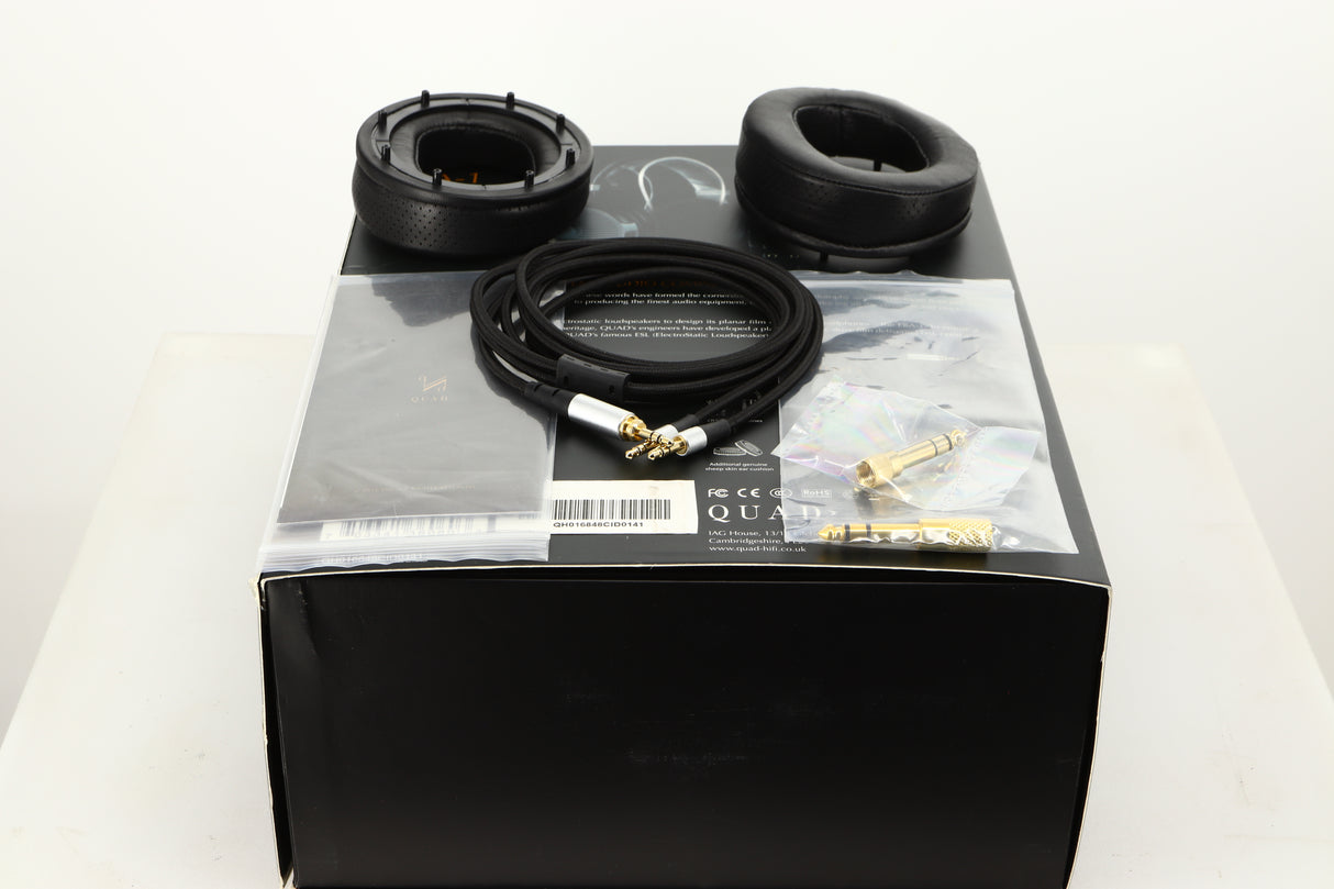 Box for used Quad ERA-1 Headphones showing 2x Ear Muffs, Manual, 2x Adaptors and Headphone Cable