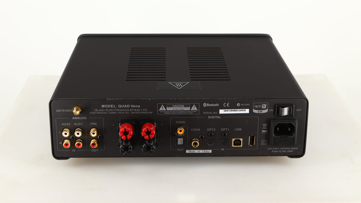 Rear view of a used Quad Vena Integrated Amplifier in a lancaster grey finish showing Phono Inputs, Phono Outputs, Optical Inputs, Optical Output, USB Inputs, Speaker Outputs and Mains Input