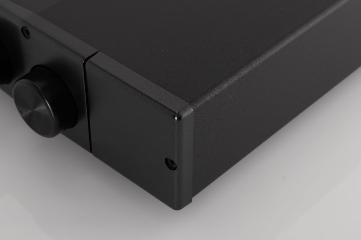 Front right corner of a used Rega Brio Integrated Amplifier in a Black finish