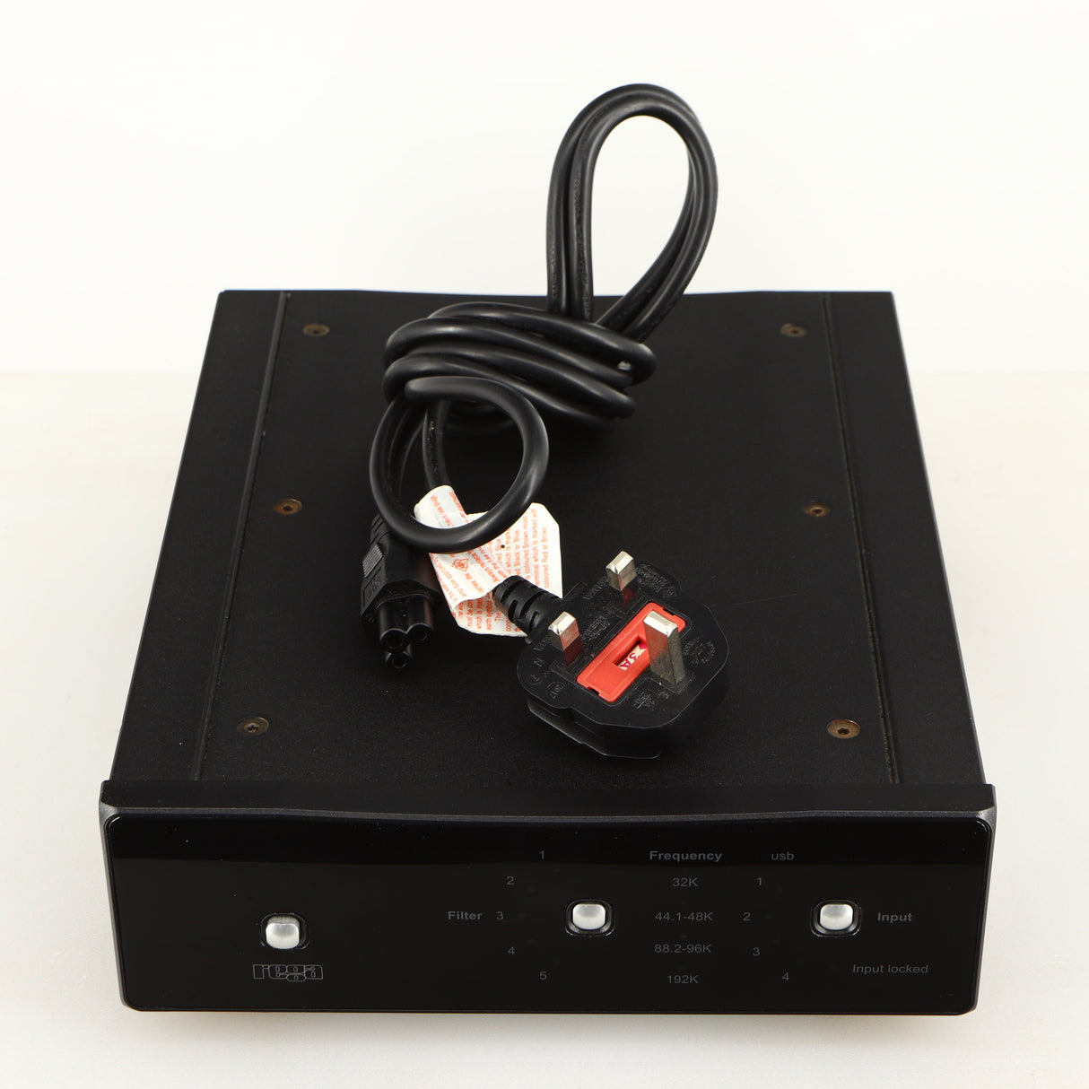 Top of a used Rega DAC Digital Analogue Converter in a black finish showing Power Cable