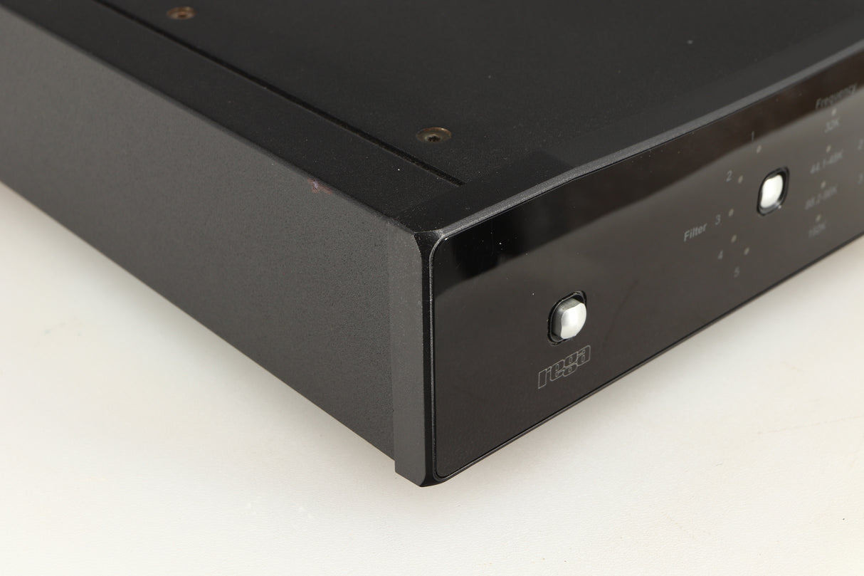 Front left corner of a used Rega DAC Digital Analogue Converter in a black finish