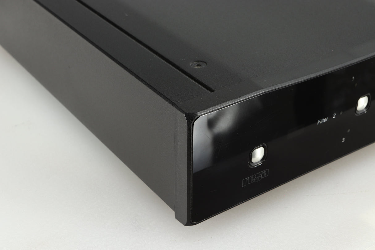 Front left corner of a used Rega DAC-R Digital Analogue Converter in a black finish