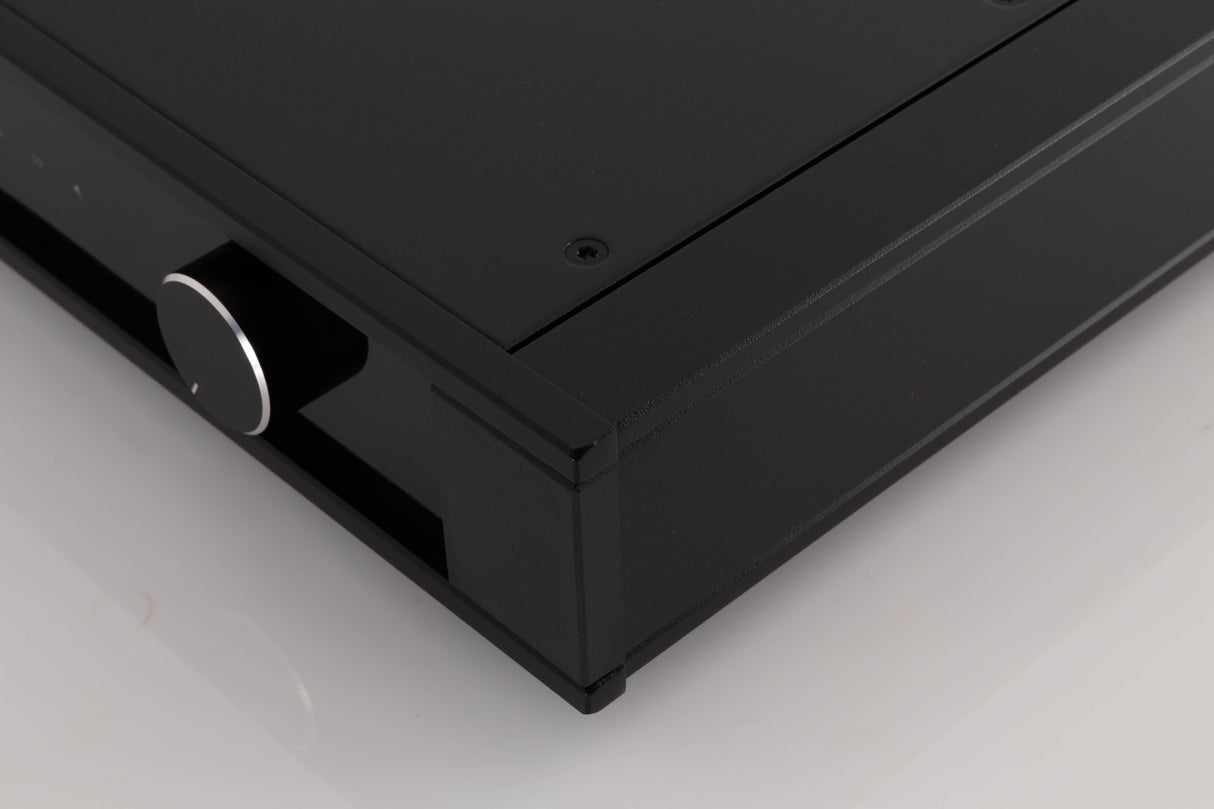 Front right corner of a used Rega Elex MK4 Integrated Amplifier in a Black finish