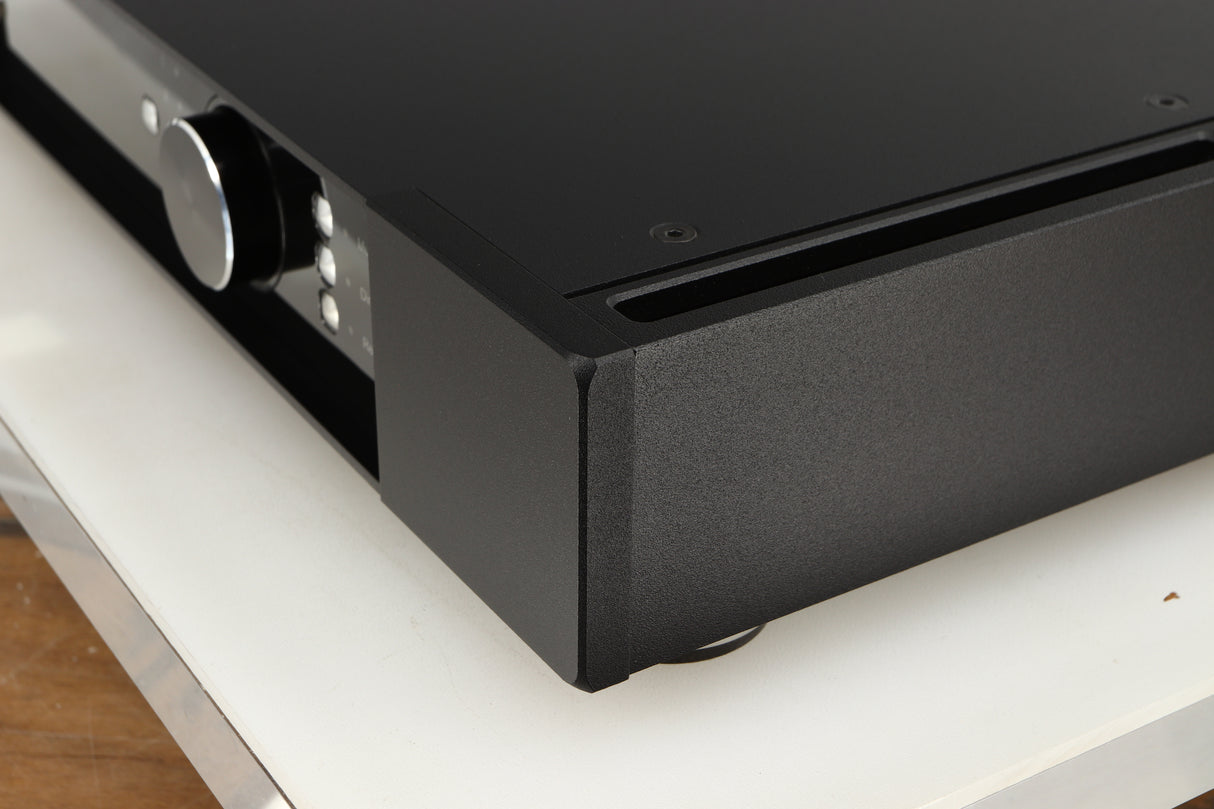 Front right corner of a used Rega Elicit-R Integrated Amplifier in a black finish
