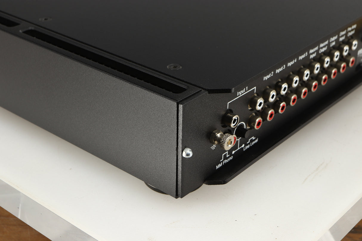 Rear right corner of a used Rega Elicit-R Integrated Amplifier in a black finish
