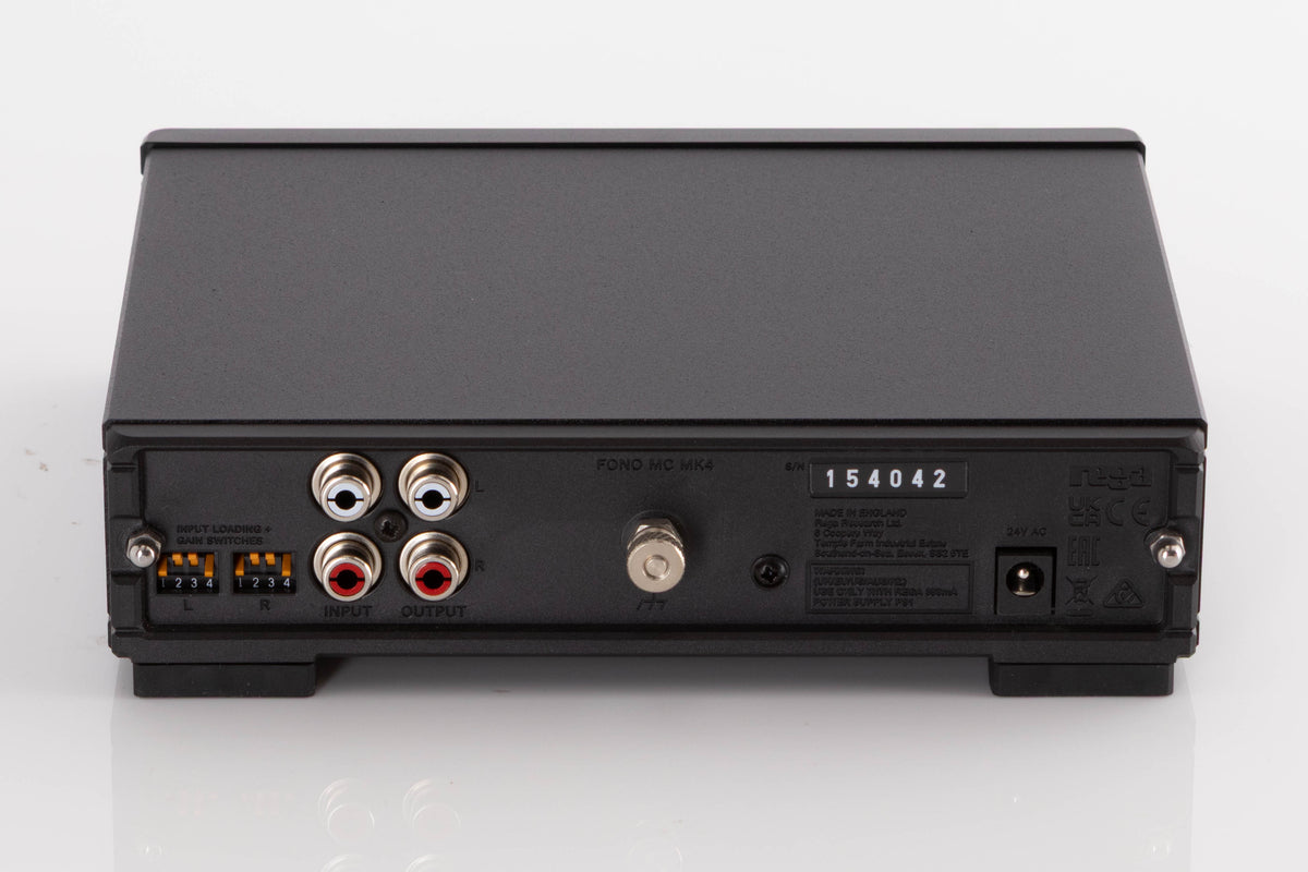 Rear view of a used Rega FONO MC MK4 Phonostage in a Black finish showing Power Input, Phono Inputs and Phono Outputs