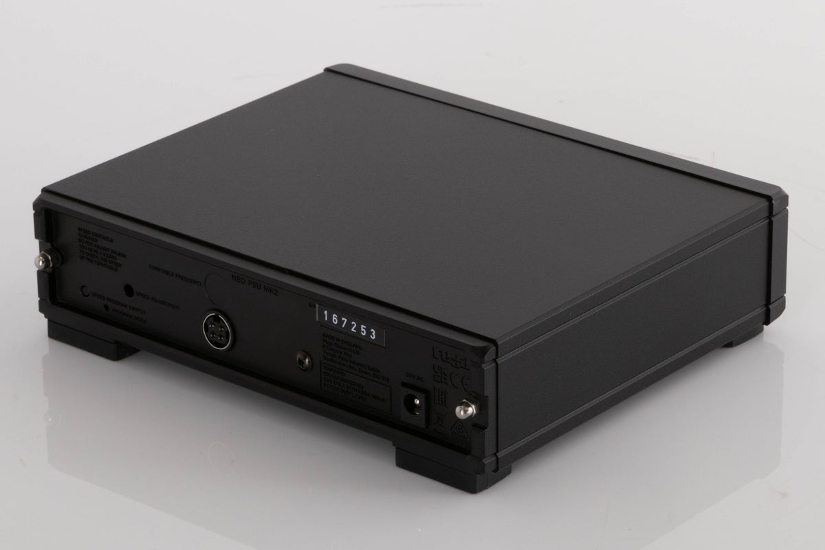 Rear left corner of a used Rega NEO Turntable Power Supply in a Black finish