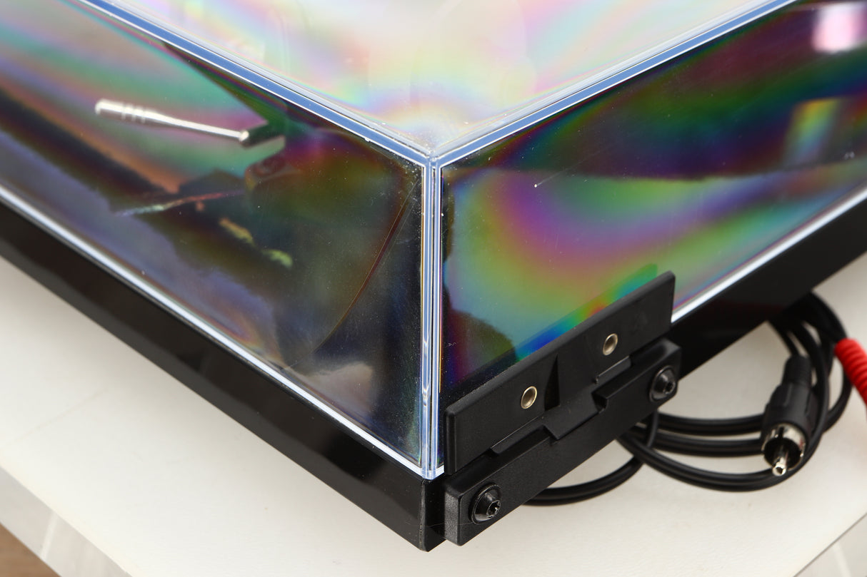 Rear left corner view of a used Rega Planar 1 ECO Turntable in Black Gloss finish