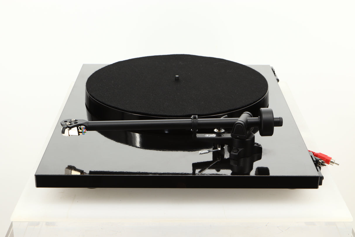 Side view of a used Rega Planar 1 ECO Turntable in Black Gloss finish