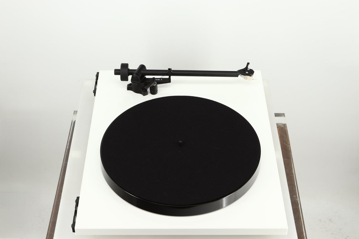 Left side view of a used Rega Planar 1 Plus Turntable in a white finish