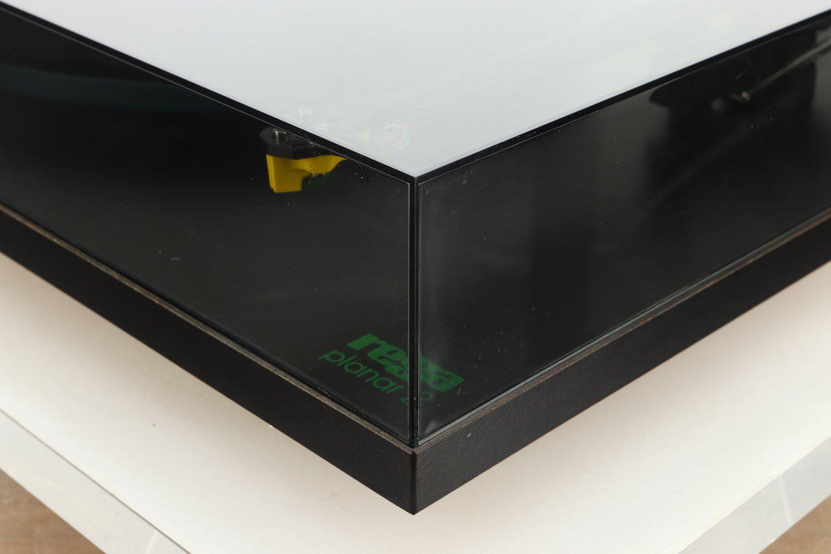 Front right corner of a used Rega Planar 2 Turntable / 24V Upgraded / Exact Cartridge in a black finish