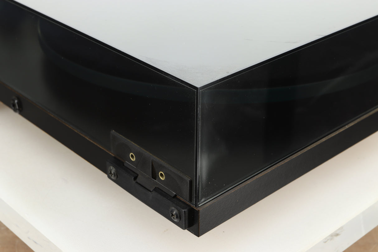 Rear left corner of a used Rega Planar 2 Turntable / 24V Upgraded / Exact Cartridge in a black finish