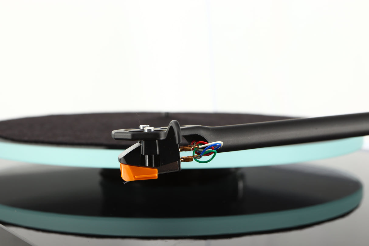 Close up of a used Rega Planar 2 Turntable / AT-VM95EN Cartridge in a black finish showing stylus