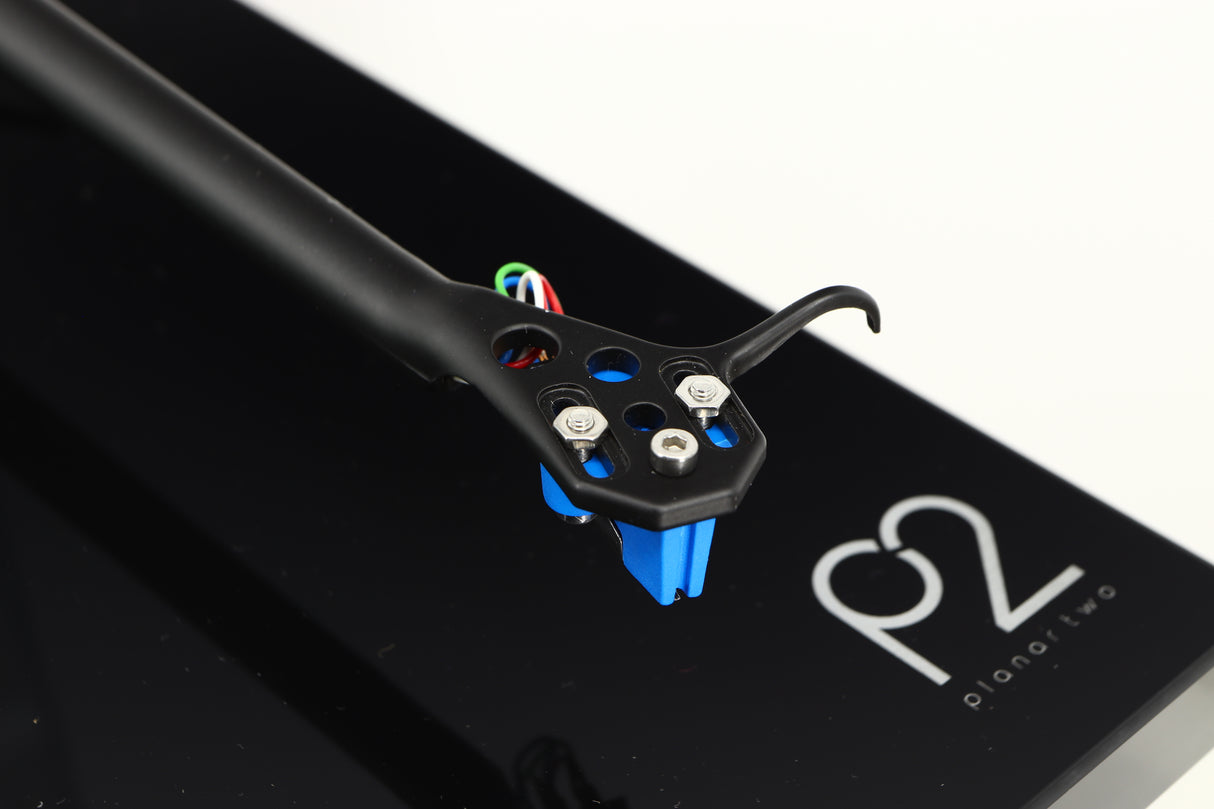 Close up of a used Rega Planar 2 / Elys 2 Cartridge in a black gloss finish showing the cartridge