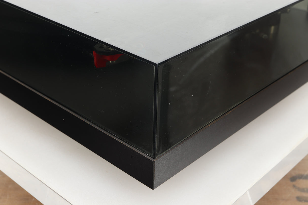 Front right corner of a used Rega Planar 3 Turntable 24V Upgraded in a black finish