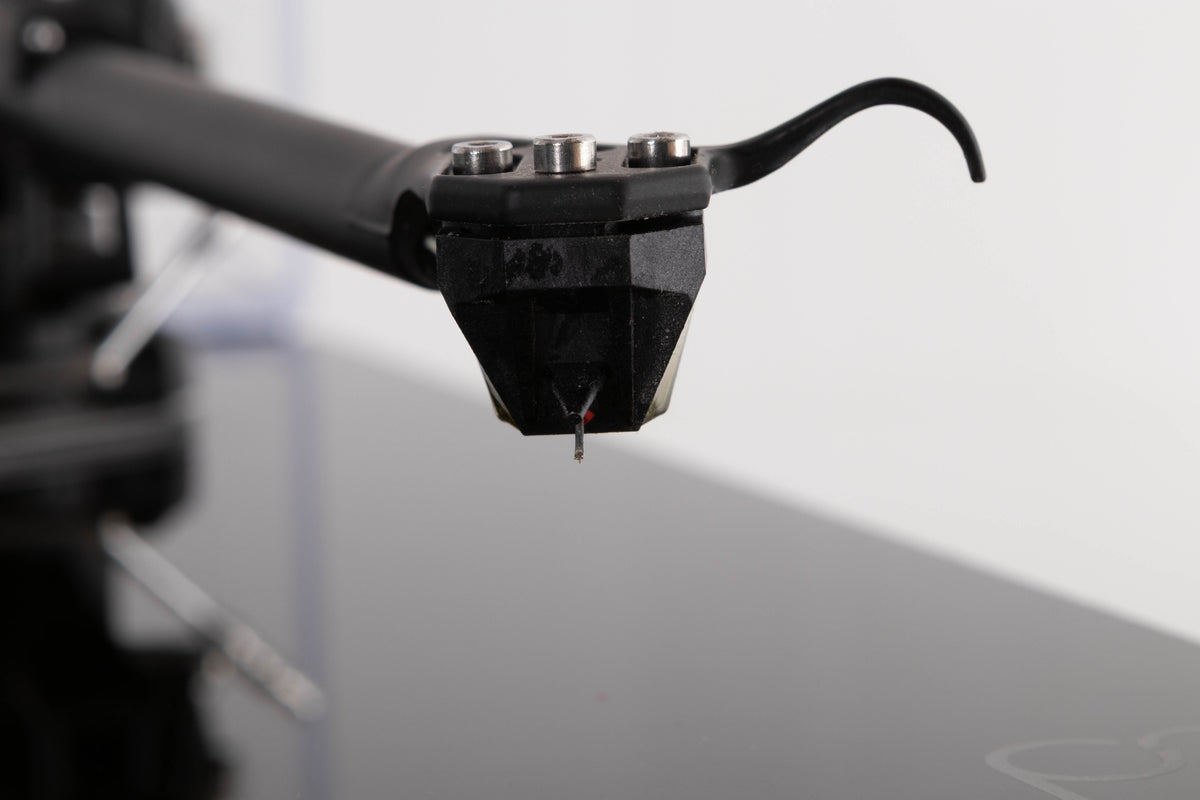 Close up view of a used Rega Planar 3 Turntable in Black with ND7 Cartridge