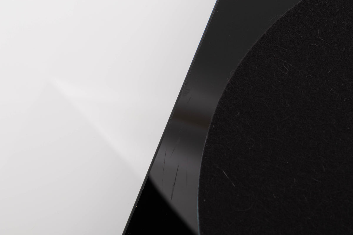 Close up view of a used Rega Planar 3 Turntable in Gloss Black with Elys Cartridge