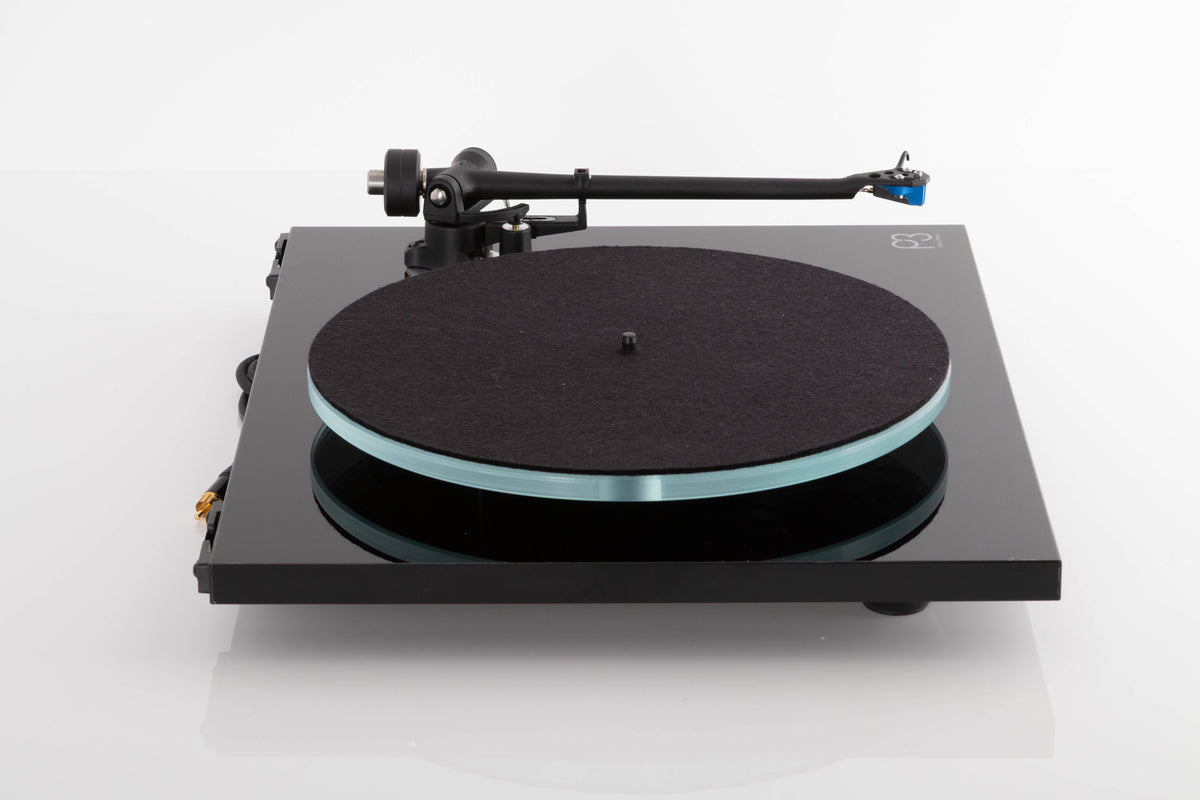 Side view of a used Rega Planar 3 Turntable in Gloss Black with Elys Cartridge