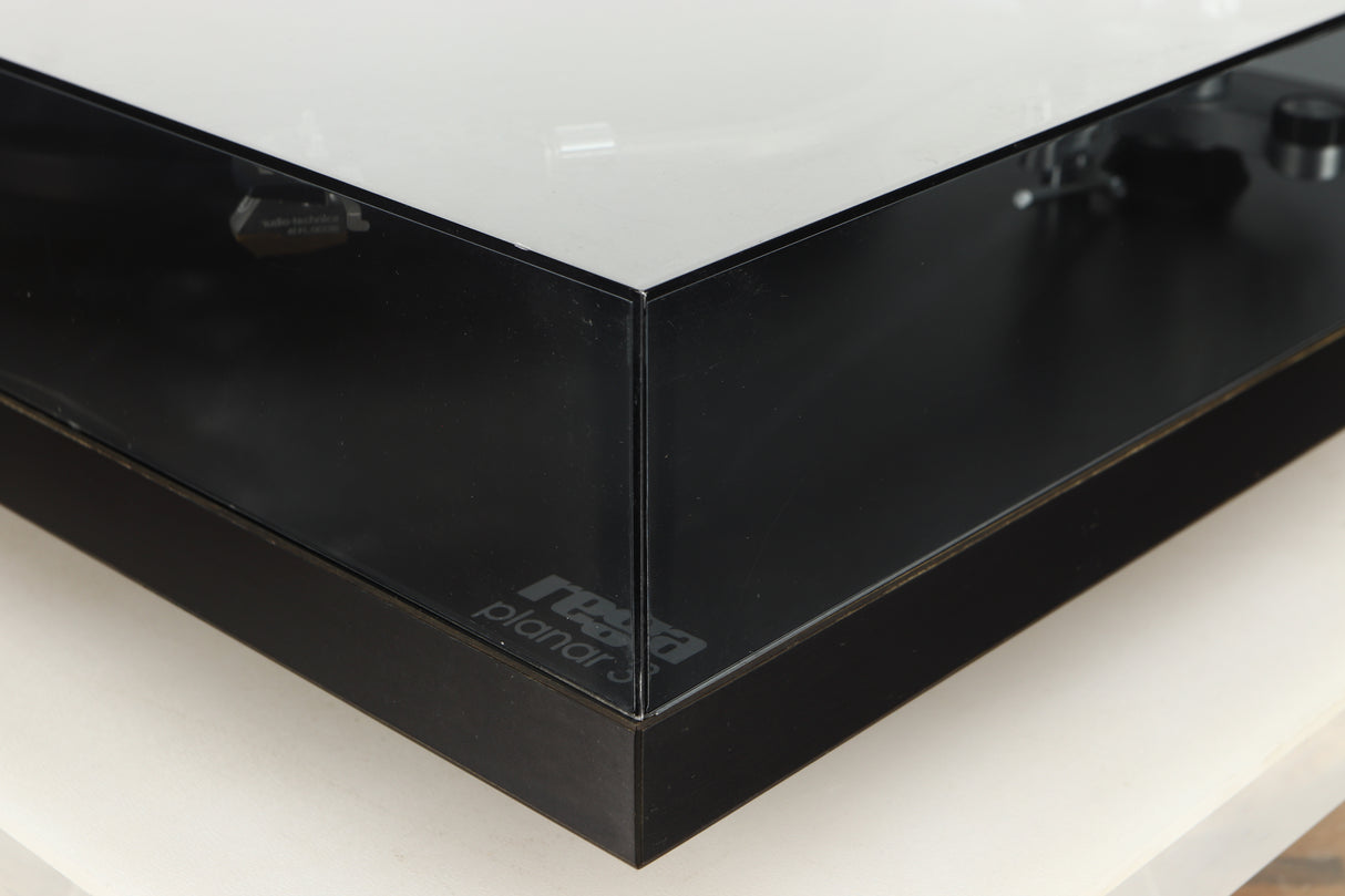 Front right corner view of a used Rega Planar 3 Turntable
