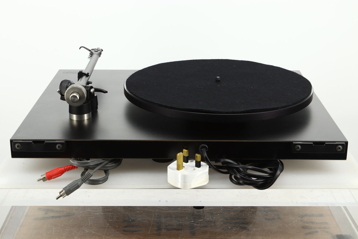 Rear view of a used Rega Planar 3 Turntable showing mains cable, and RCAs