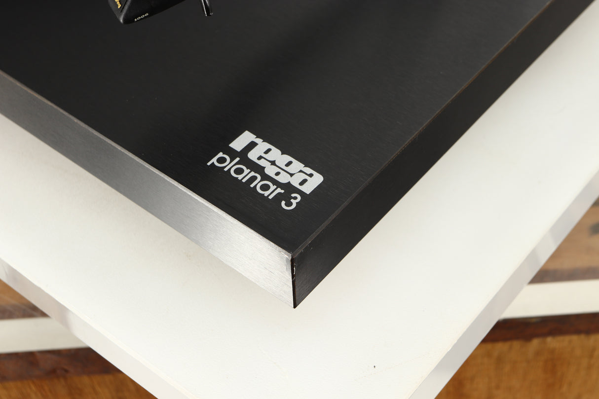 Close up of a used Rega Planar 3 Turntable W/ Goldring 1006 Cartridge in a black finish showing blemishes