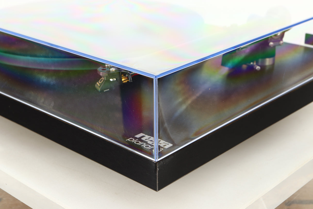 Front right corner of a used Rega Planar 3 Turntable W/ Goldring 1006 Cartridge in a black finish
