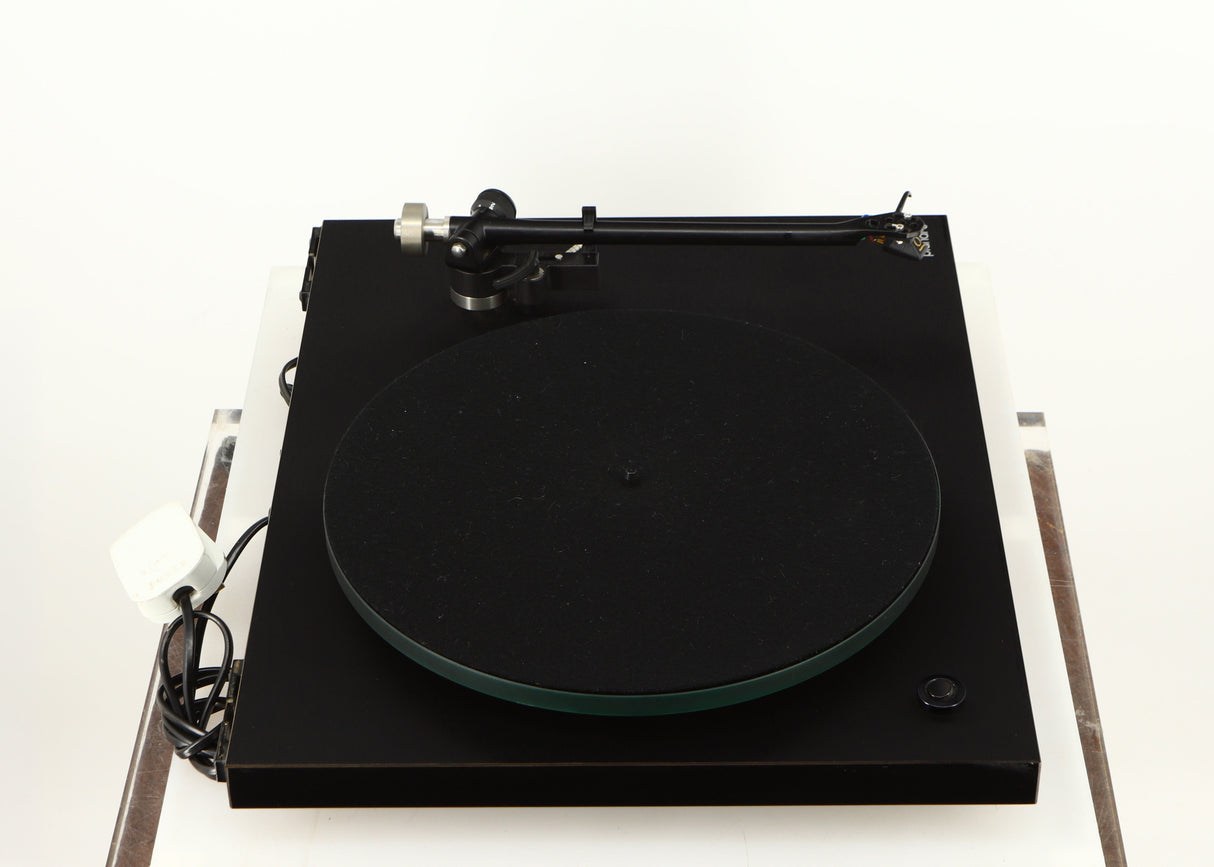 Left side view of a used Rega Planar 3 Turntable W/ Goldring 1006 Cartridge in a black finish