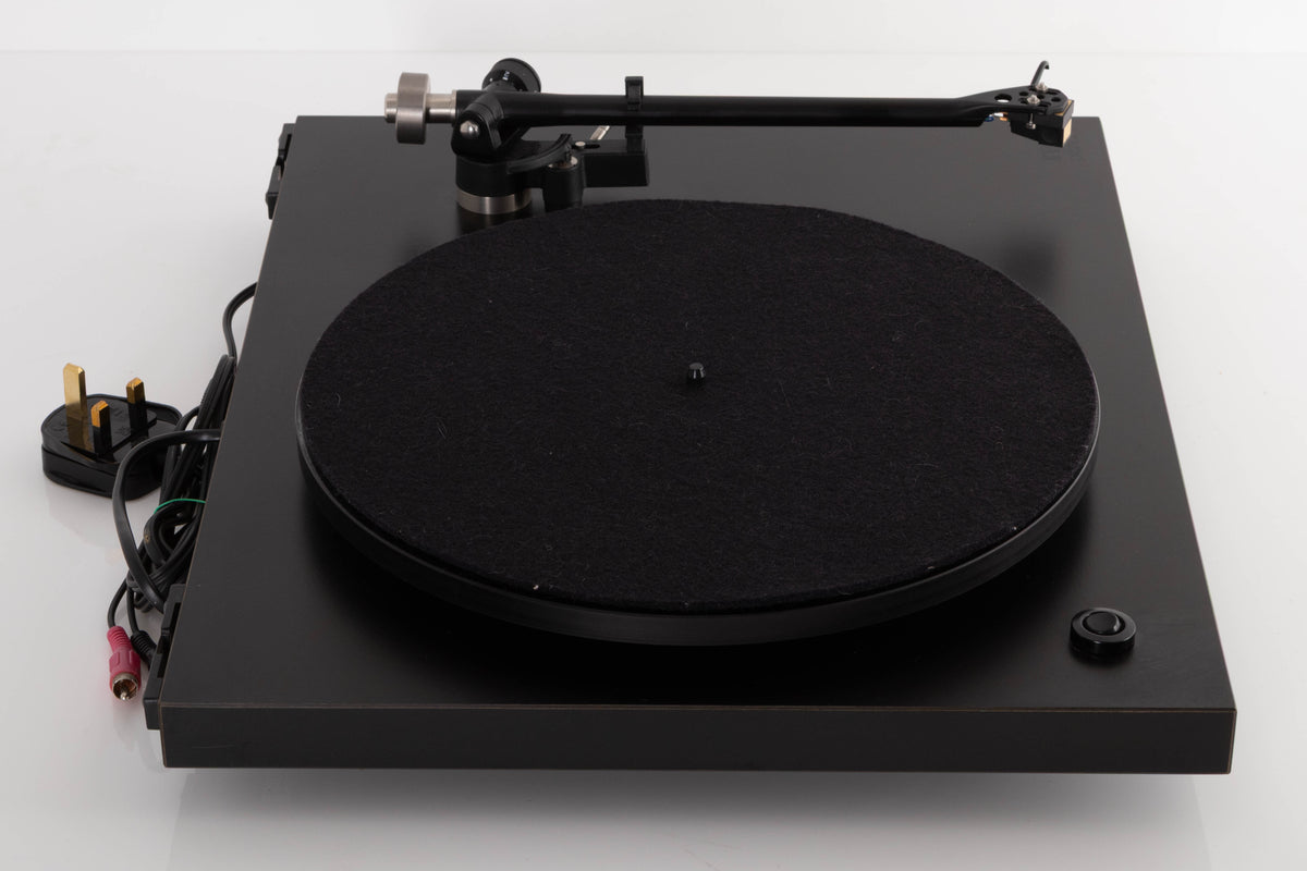Left side view of a used Rega Planar 3 Turntable W/ Nagaoka MP11 Boron Cartridge in a Black finish