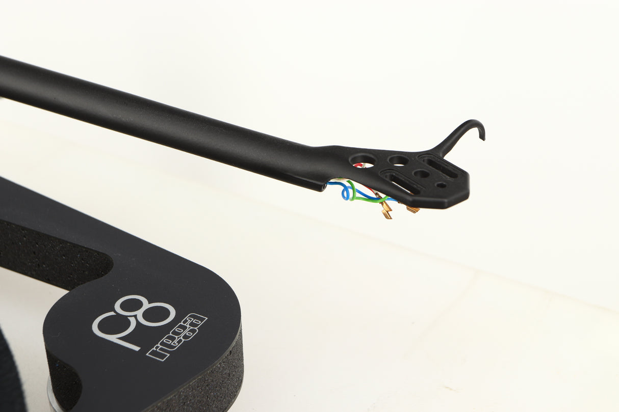 Close up of a used Rega Planar 8 Turntable (No Cartridge) in a black finish showing connectors