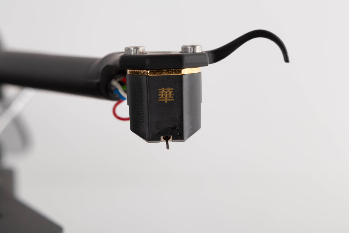 Close up view of a used Rega Planar 8 Turntable with Hana ML Cartridge