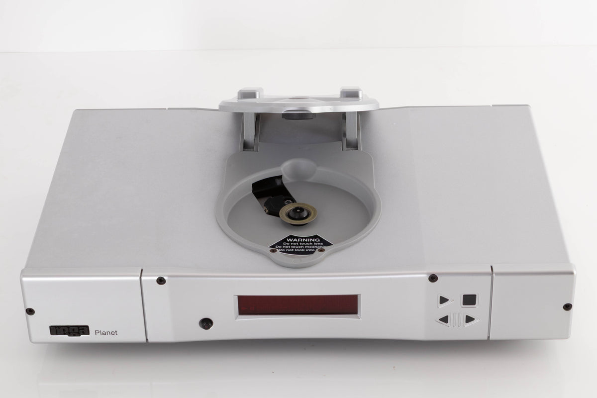 Top of a used Rega Planet CD Player in a Silver finish