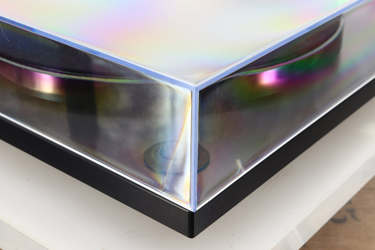 Front left corner of a used Rega RP1 Turntable in a cool grey finish