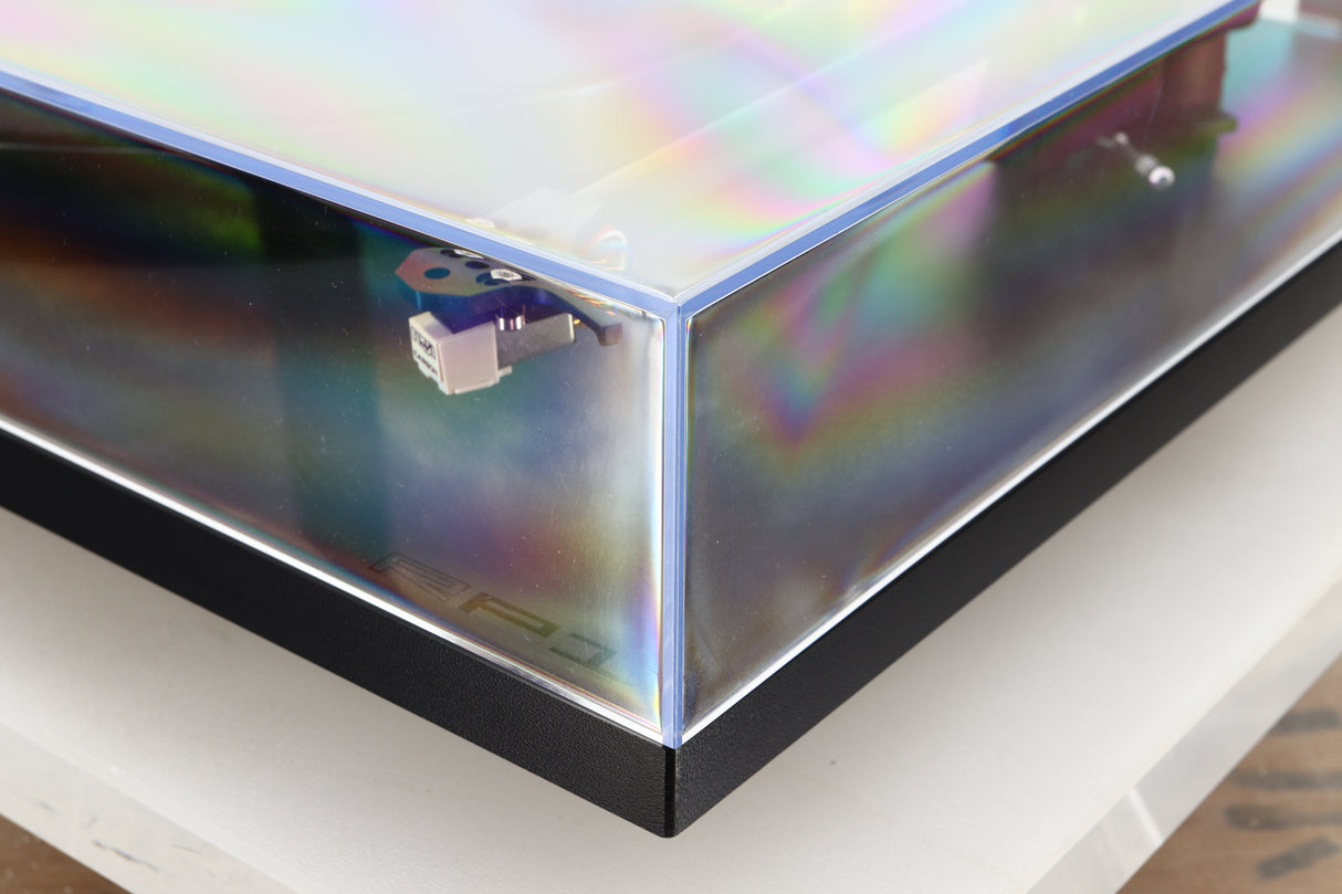 Front right corner of a used Rega RP1 Turntable in a cool grey finish