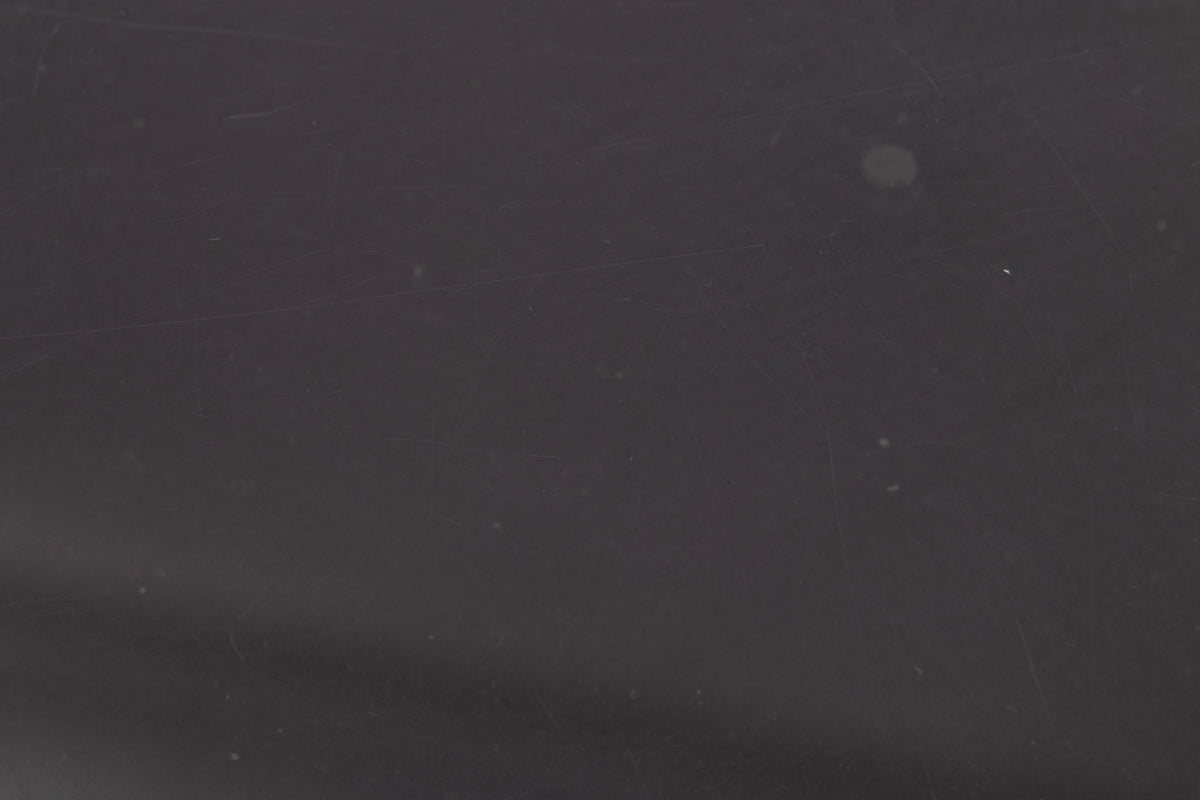 Close up view of a used Rega RP3 Turntable in Cool Grey with AT-VM95SH Cartridge showing scratches on the lid